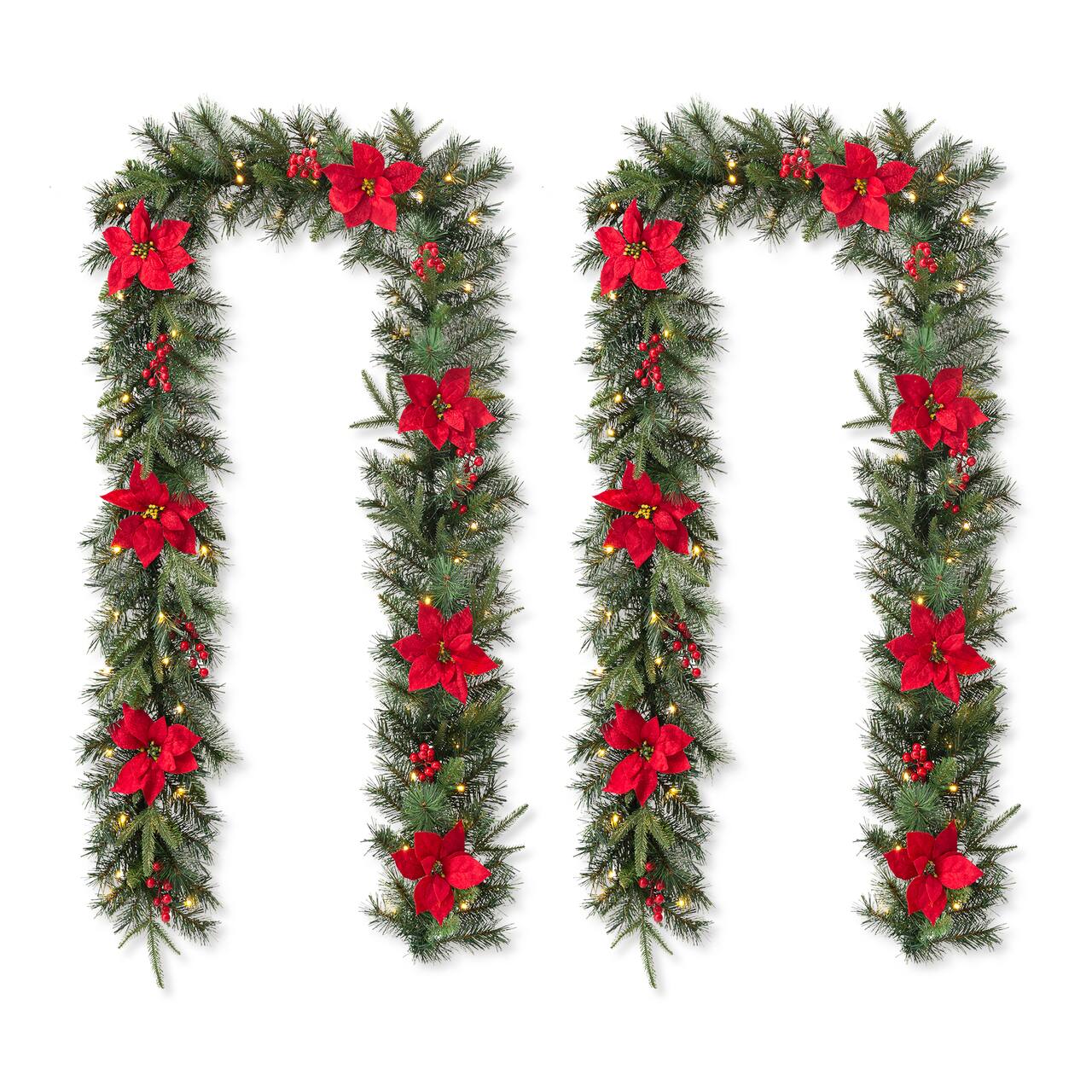 Glitzhome® 9ft. Pre-Lit Greenery Pine Poinsettia and Berries Christmas Garland with LED Lights and Timer